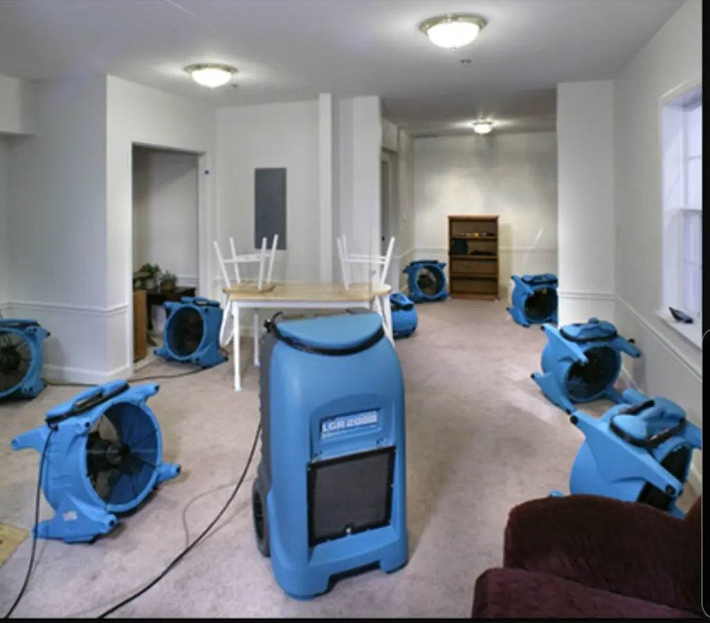 Air movers and dehumidifier setup for Water Damage Restoration in Bellview